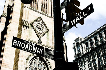 street signs at crossroads in the downtown district of new york, concept of giving direction, broadwayの写真素材