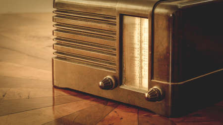 closeup of retro vintage wooden radio on old tableの写真素材