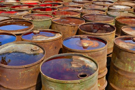 Empty rusting toxic chemical barrels の写真素材