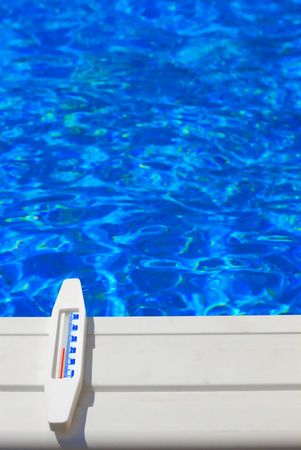 Blue clear water of waterpool and thermometerの写真素材