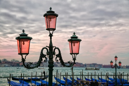 Rose colored lights along the Grand Canal in Venice, Italy at sunset.の写真素材