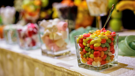 Delicious wedding reception candy bar dessert tableの写真素材