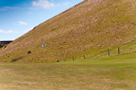 Small greens and challenging terrain are the main features of rural golf in the UK.の写真素材