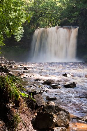 Sgwd yr Eira in the Brecon Beacons National Park, Wales. Running at full flow after heavy rainの写真素材