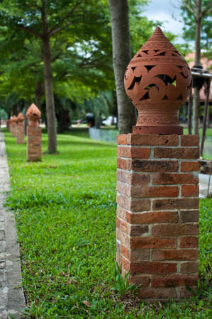 Thai style ceramic street lamp on red brick standの写真素材