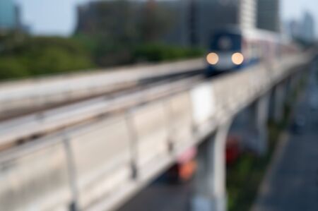 Blur image of an incoming BTS sky train in the city of Bangkok Thailandの写真素材