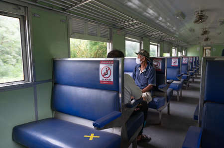 Sakaeo/Thailand - June 14, 2020: Social distancing for COVID-19 pandemic counter measure in a passenger bogey of the train by labeling and allow 1 seat for 1 personのeditorial素材