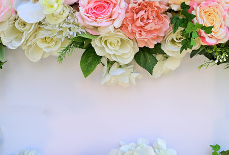 Flowers and leaves decorated on blank white paper planeの写真素材
