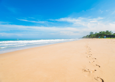 Footprint on sea beach blue sky sand sun daylight relaxation landscape viewpoint for design postcard and calendar in Phuket, thailand Seascape wallpaper background, travel, relax destinationの写真素材