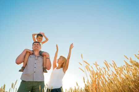 happy family having fun outdoorsの写真素材