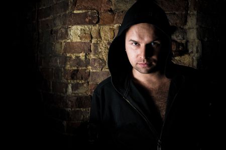 fashion male portrait over a black backgroundの写真素材