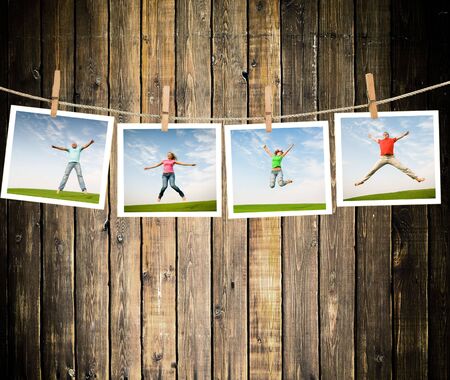 jumping people on idyllic landscapeの写真素材
