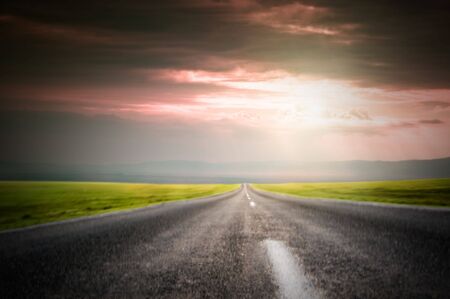 road in motion at sunsetの写真素材