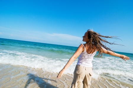 woman running at the beachの写真素材