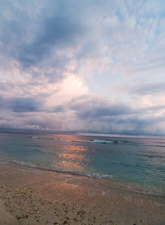 idyllic tropical sunrise in seaの写真素材