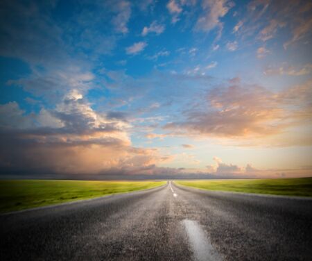 road in motion at sunsetの写真素材