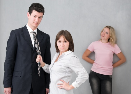 man and two his girlfriendsの写真素材