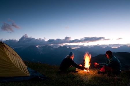 couple tent camping in the wildernessの写真素材