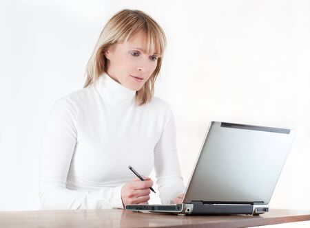 woman working on computer on white backgroundの写真素材