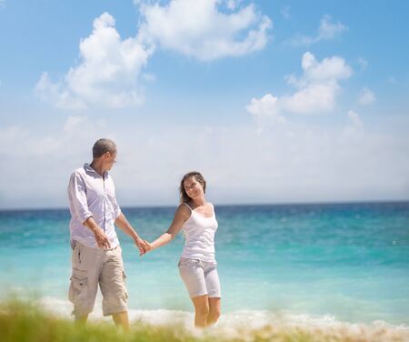 couple having fun at seasideの写真素材