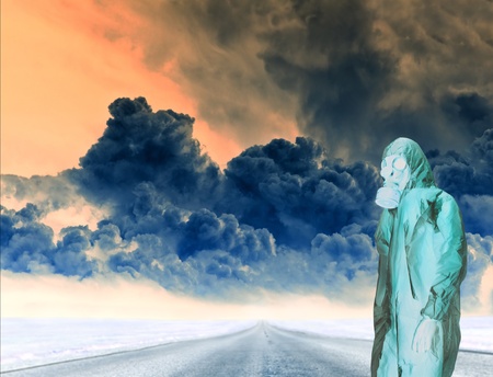 man wearing gas mask with explosion backgroundの写真素材