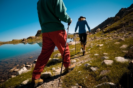 couple hiking in the mountain の写真素材