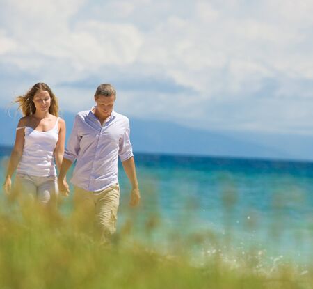 couple having fun at seasideの写真素材