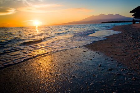 a tropical sunrise in Indonesiaの写真素材