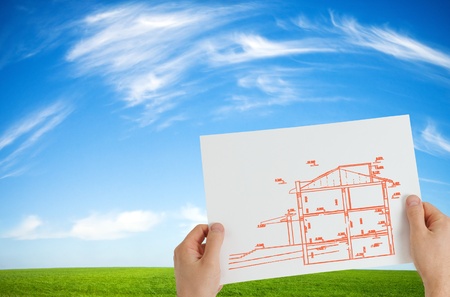 new house outline over idyllic backgroundの写真素材