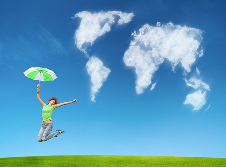 a woman with umbrella on earth backgroundの写真素材