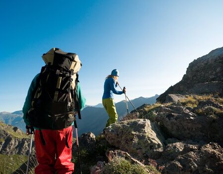couple hiking in the mountain の写真素材