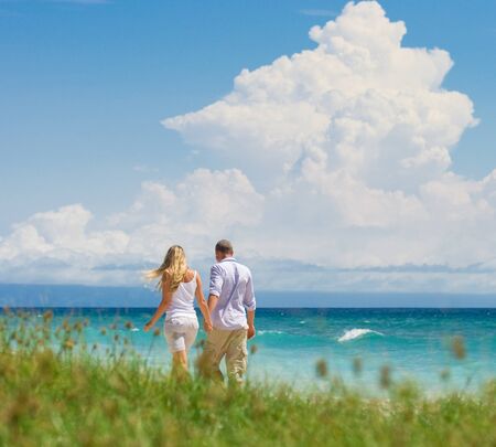 couple having fun at seasideの写真素材