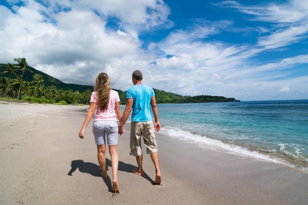 couple having fun at beachの写真素材