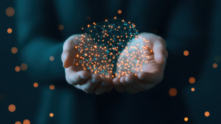 A mesmerizing image of hands holding swirling particles of light, symbolizing creativity and the power of imagination.の素材