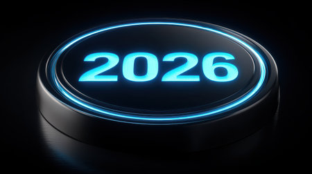 Futuristic illuminated button displaying the year 2026 with a glossy surface and glowing edges on a sleek dark backgroundの素材