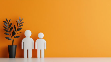 Two minimalistic figurines standing next to a black pot with green leaves on a bright orange wall background in a modern interior design settingの素材