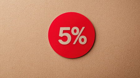 Bright red circle displaying a bold 5 percent symbol on a textured beige backdrop, perfect for promotions, discounts, and sales campaignsの素材