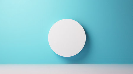 Minimalist White Circle Against Bright Blue Wall for Modern Art Projects and Design Inspirationsの素材