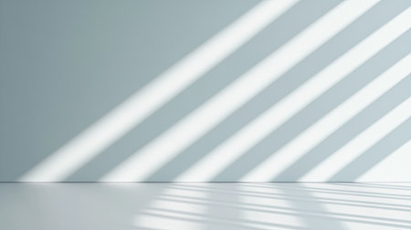 A minimalist interior with soft light and shadows creating a tranquil atmosphere.の素材