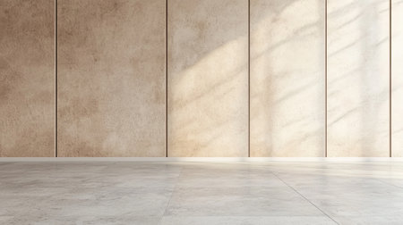 A minimalistic interior featuring smooth concrete flooring and light-colored walls, illuminated by soft, natural light.の素材