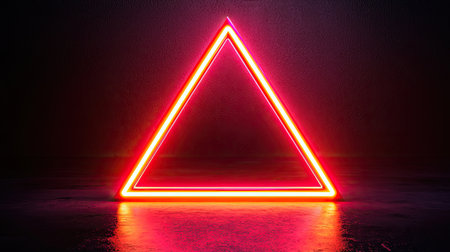 A glowing neon triangle is displayed against a dark background, creating a striking visual contrast with vibrant red light.の素材