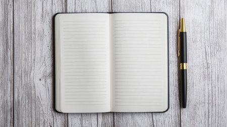A clean, blank notebook with a pen, perfect for jotting down notes, ideas, or plans for any creative project.の素材