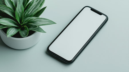 A close-up view of a cell phone on a tableの素材