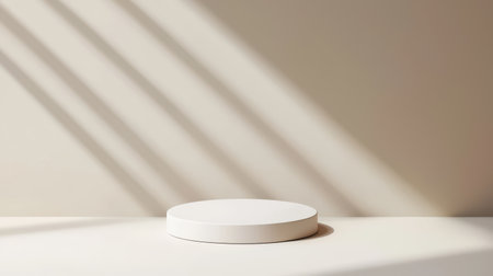 Elegant round podium centered on soft matte backdrop, subtle shadows, ideal for branding, product mockups, modern aestheticsの素材