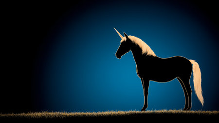 Silhouette of a unicorn against a dark blue background.の素材