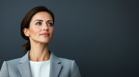 Confident woman presenting investment strategy engaging posture sleek boardroom spotlight effect side angle perspective, Realistic Photoの素材
