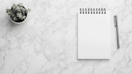 Minimalist stationery layout with monochrome palette calming vibe soft diffused light top-down view sleek marble surfaceの素材