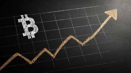 Graphical Representation of Bitcoin Price Increase with Upward Trend and Chart on Black Backgroundの素材
