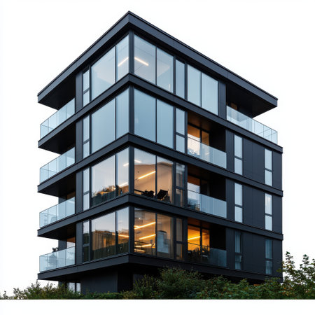 Modern black glass building with sleek architecture and illuminated interior, showcasing urban design and contemporary style at duskの素材