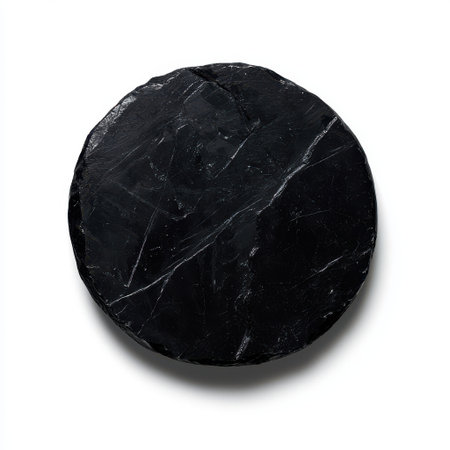 Black Slate Stone with Smooth Surface Isolated on White Background for Natural Texture and Design Elements in Photography and Art Projectsの素材